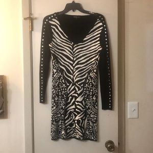 Sweater dress size small. Uniquely studded sleeves